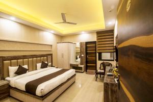Postel nebo postele na pokoji v ubytování Hotel Mahajan International, Delhi Airport