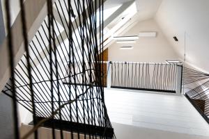 Postel nebo postele na pokoji v ubytování Apartamenty Vilda