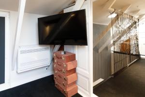 TV a/nebo společenská místnost v ubytování Apartamenty Vilda