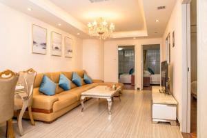 Area soggiorno di Guangzhou Pengman Apartment Zhengjia Huanshi Branch