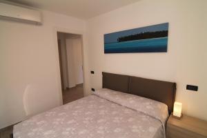 Postel nebo postele na pokoji v ubytování SeaHouse 114
