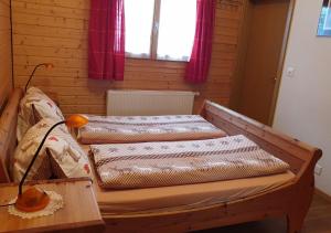 Postel nebo postele na pokoji v ubytování Hotel-Restaurant le Relais Panoramique