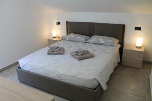 Postel nebo postele na pokoji v ubytování SeaHouse 114