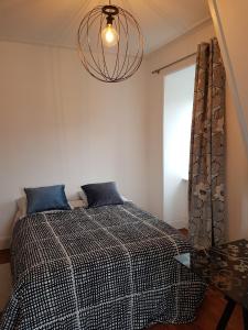 Postel nebo postele na pokoji v ubytování ATELIER ART DECHO