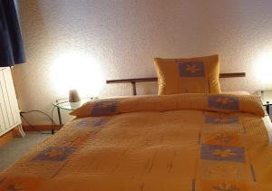 Postel nebo postele na pokoji v ubytování Hotel-Restaurant le Relais Panoramique