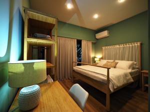 A bed or beds in a room at Sophia's Penthouse Apartment With Jacuzzi and Acropolis View From Big Terrace