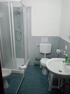 Kúpeľňa v ubytovaní Olimpica Relais guest house