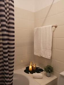 Ванна кімната в Kiss - Apartamentos Turísticos