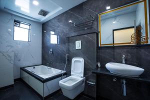 Koupelna v ubytování Megh Residency Navi Mumbai