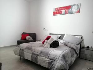 A bed or beds in a room at B&B I SIKULI