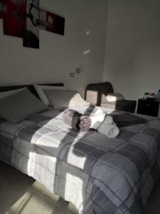 A bed or beds in a room at B&B I SIKULI