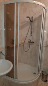 Kúpeľňa v ubytovaní Apartament ZOYA + garaż