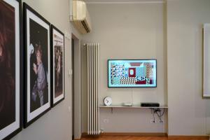 TV/trung tâm giải trí tại Pompeo Apartment