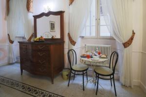 Un lugar para sentarse en La Maison Dell'Orologio