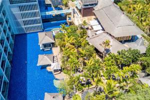 Bazén v ubytování The Sakala Resort Bali All Suites nebo v jeho okolí