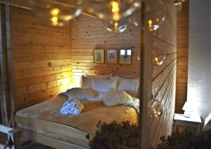 Postel nebo postele na pokoji v ubytování Mountain Lodge Mont Peace