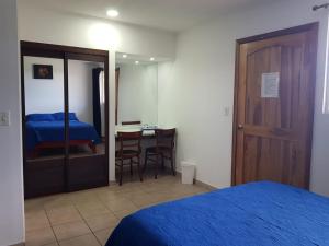Postel nebo postele na pokoji v ubytování Hotel Grosseto Palma Real