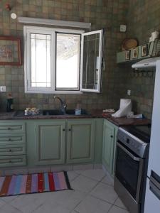 Kuchyň nebo kuchyňský kout v ubytování Eftychias residence