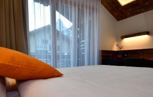 Postel nebo postele na pokoji v ubytování Hotel Elite