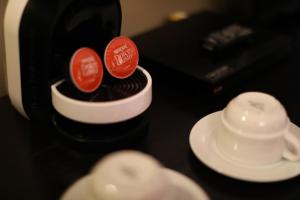 a bottle of sauce sitting on top of a counter at Hotel Montetaxco in Taxco de Alarcón