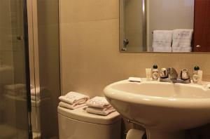 Um banheiro em Hotel Ferrua