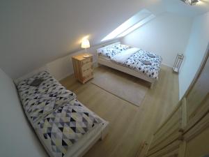 Vuode tai vuoteita majoituspaikassa Apartmány Dúbrava