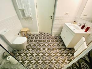 Ένα μπάνιο στο Vitoria's Terrace Apartments