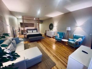 Ένα ή περισσότερα κρεβάτια σε δωμάτιο στο Vitoria's Terrace Apartments