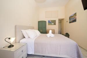 Ένα ή περισσότερα κρεβάτια σε δωμάτιο στο Aegealis Studios
