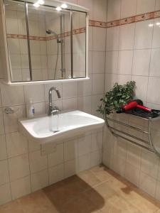 Kúpeľňa v ubytovaní Katarina's cozy bungalov