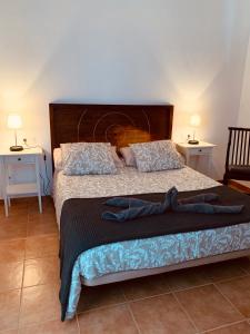 Llit o llits en una habitació de Casa Marta, private pool, free WiFi