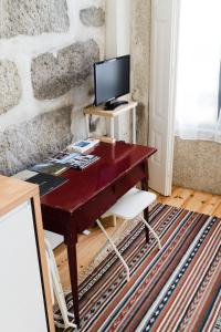 TV a/nebo společenská místnost v ubytování Cosy and Modern Flat in Porto