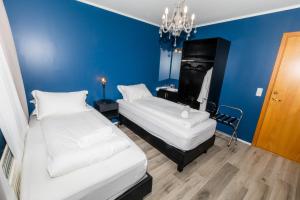 Krevet ili kreveti u jedinici u okviru objekta Hotel North