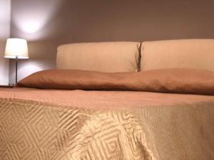 Posteľ alebo postele v izbe v ubytovaní B&B Capuam Vetere Accommodation