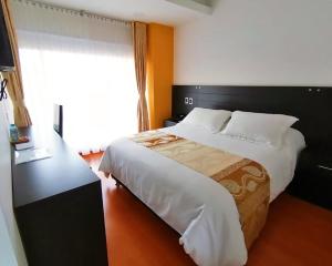 Ένα ή περισσότερα κρεβάτια σε δωμάτιο στο Hotel Palermo Suite