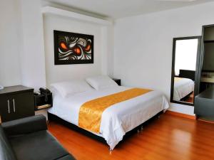 Ένα ή περισσότερα κρεβάτια σε δωμάτιο στο Hotel Palermo Suite
