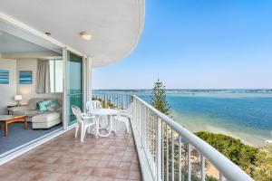 a balcony with a view of the water at Crystal Bay On The Broadwater in Gold Coast