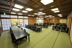 A restaurant or other place to eat at Watazen Ryokan - Established in 1830