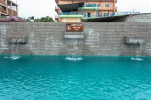 Πισίνα στο ή κοντά στο Atithi Resort & Spa