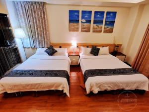 Postelja oz. postelje v sobi nastanitve Yilan Golf B&B