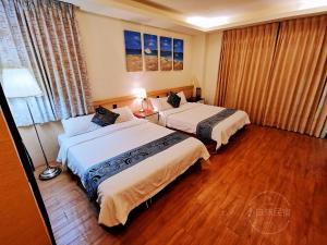 Postelja oz. postelje v sobi nastanitve Yilan Golf B&B