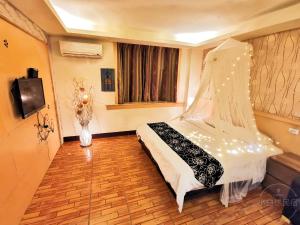 TV a/nebo společenská místnost v ubytování Yilan Golf B&B