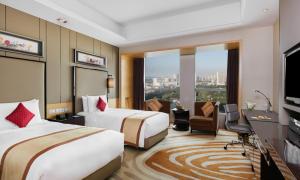 Postel nebo postele na pokoji v ubytování InterContinental Tangshan by IHG