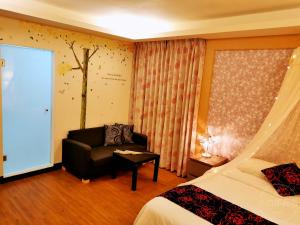 Postelja oz. postelje v sobi nastanitve Yilan Golf B&B