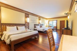Postel nebo postele na pokoji v ubytování Banpu Resort Trat + 37 fotografií