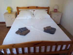 Ένα ή περισσότερα κρεβάτια σε δωμάτιο στο Chris et Lolo 84