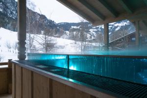 Basen w obiekcie Boutiquehotel die Alpbacherin 4 Sterne Superior lub w pobliżu