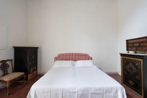 Posteľ alebo postele v izbe v ubytovaní Villa Hacienda del Batán