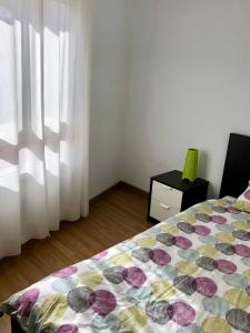 Ein Bett oder Betten in einem Zimmer der Unterkunft Vv Bimba