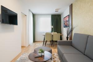 Telewizja i/lub zestaw kina domowego w obiekcie MyApartments Vienna